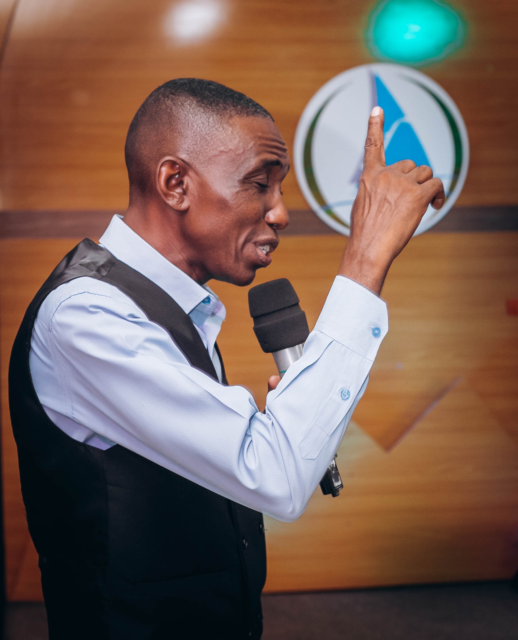 Pastor Praise Ajor preaching at Firm Foundation Upper