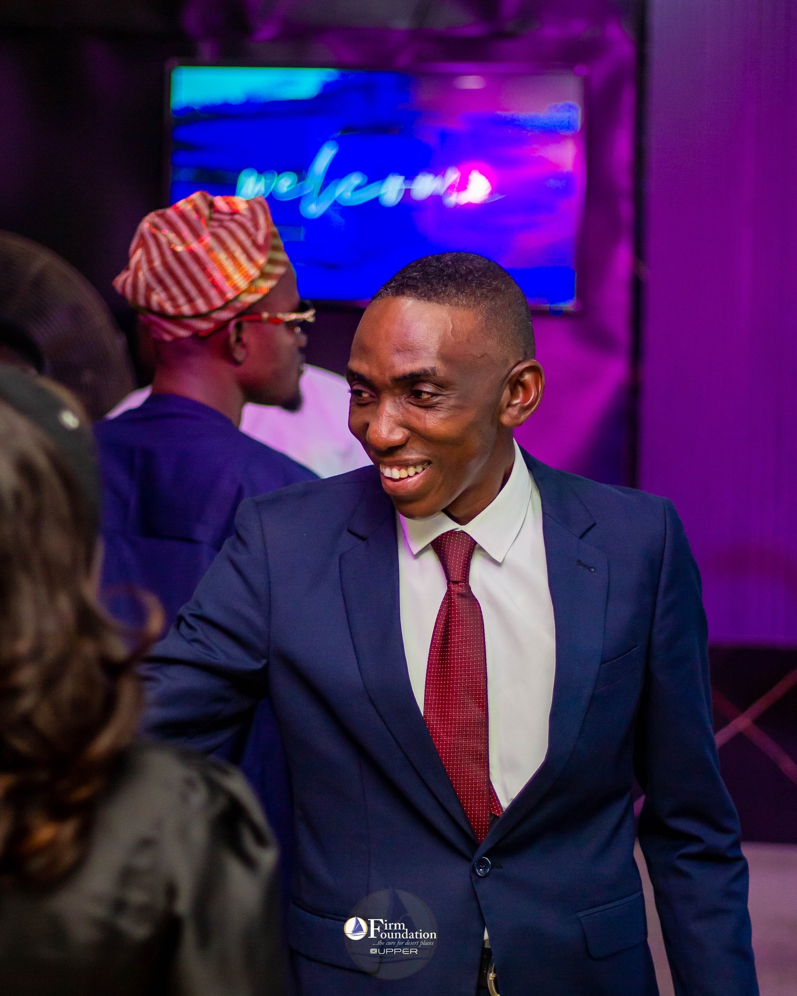 Pastor Praise Ajor in formal attire